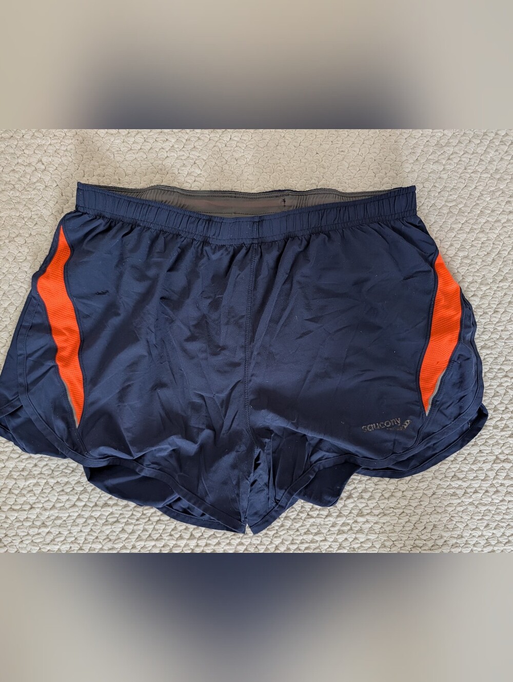 Saucony Men’s Navy Shorts with Orange Side Panels